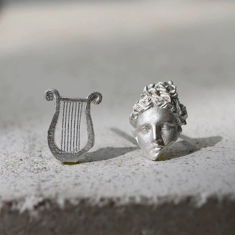 European and American Niche Design, Exquisite and High-End Feel, Burnt White Apollo and His Lyre Asymmetric Minimalist Earrings European and American Niche Design, Exquisite and High-End Feel, Burnt White Apollo and His Lyre Asymmetric Minimalist Earrings