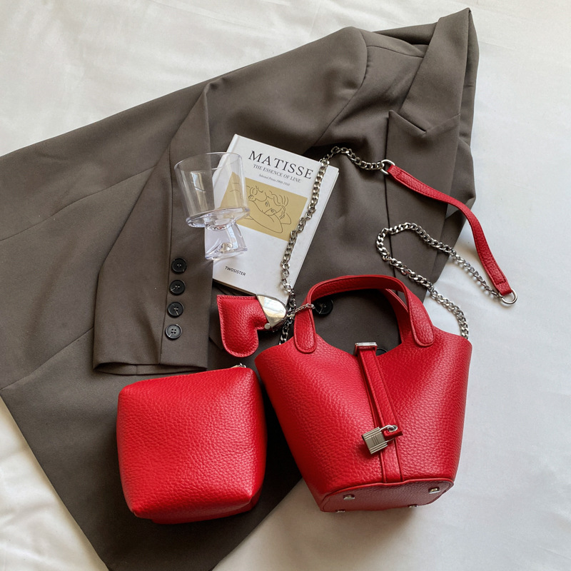 Bolso de madre de cubo de ocio simple para mujer 2025 versión coreana del nuevo bolso de mensajero exquisito de textura de moda ins