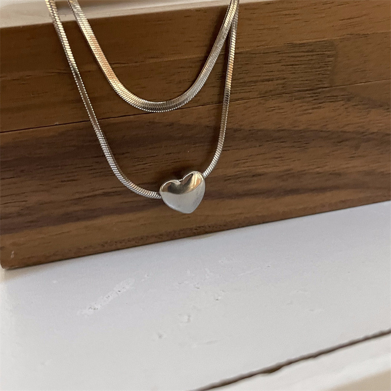 Simple Style Heart Shape Titanium Steel Layered Necklaces display picture 5