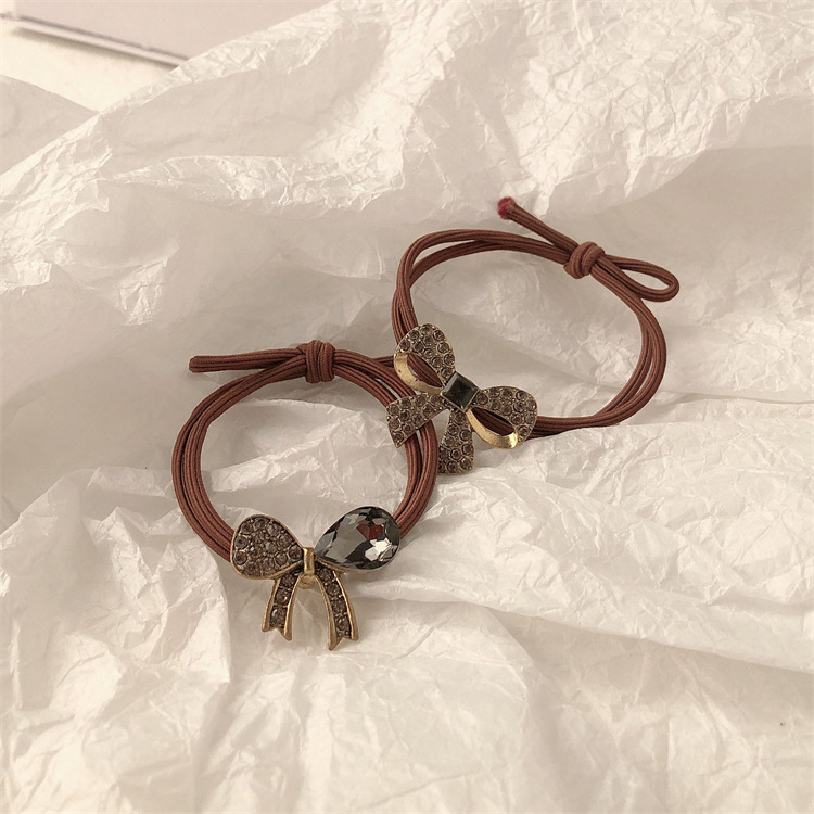 Retro aleación de diamante arco toque de cabello cuerdas de goma anillo de cabello de alta elasticidad y duradera toque de cabello