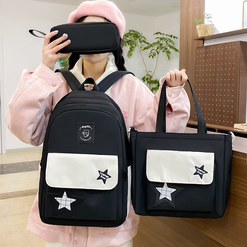 Mochila de estudiante de secundaria para mujer 2025 nuevo estilo ins versión coreana de alta apariencia y gran capacidad para estudiantes de secundaria estilo universitario mochila