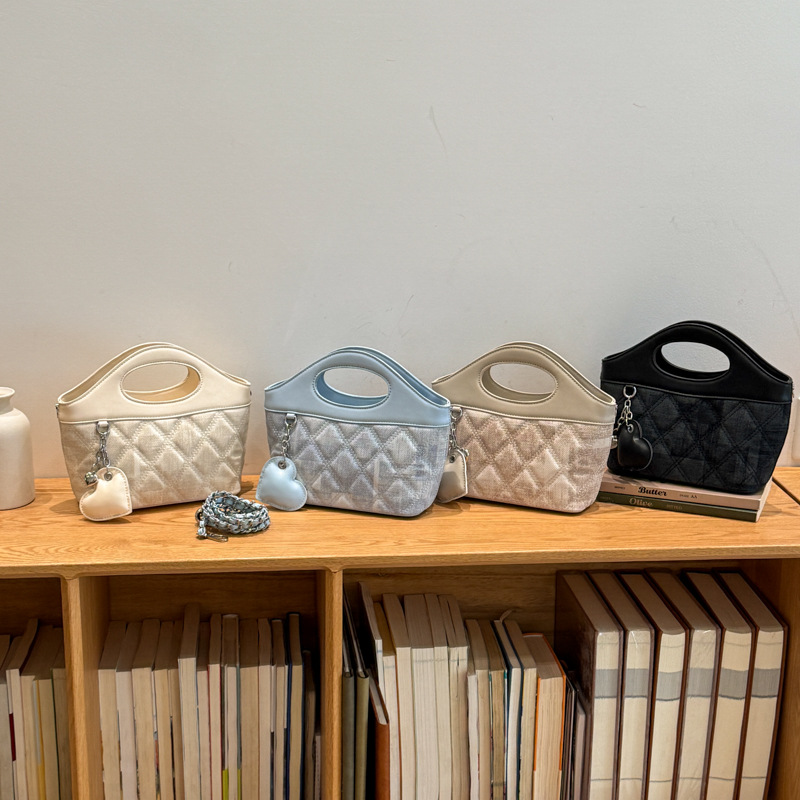 Bolsa de cadena de diamante diaria bolsa de cuero suave de mujer 2026 nuevo verano relajado bolsa de hombro inclinada para viajar