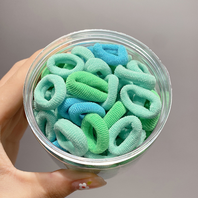 La banda de goma del pelo de la banda del lazo del pelo de los niños lindos de la cuerda del pelo del caramelo no duele el Pelo elástico buena cuerda del pelo tocado de la niña