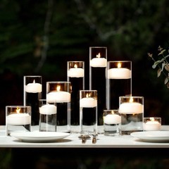 ガラスの燭台のバレンタインデーの結婚式の装飾のホウケイ酸塩の透明な円筒のガラスの燭台の水のワックスのろうそくの杯のヨーロッパ式