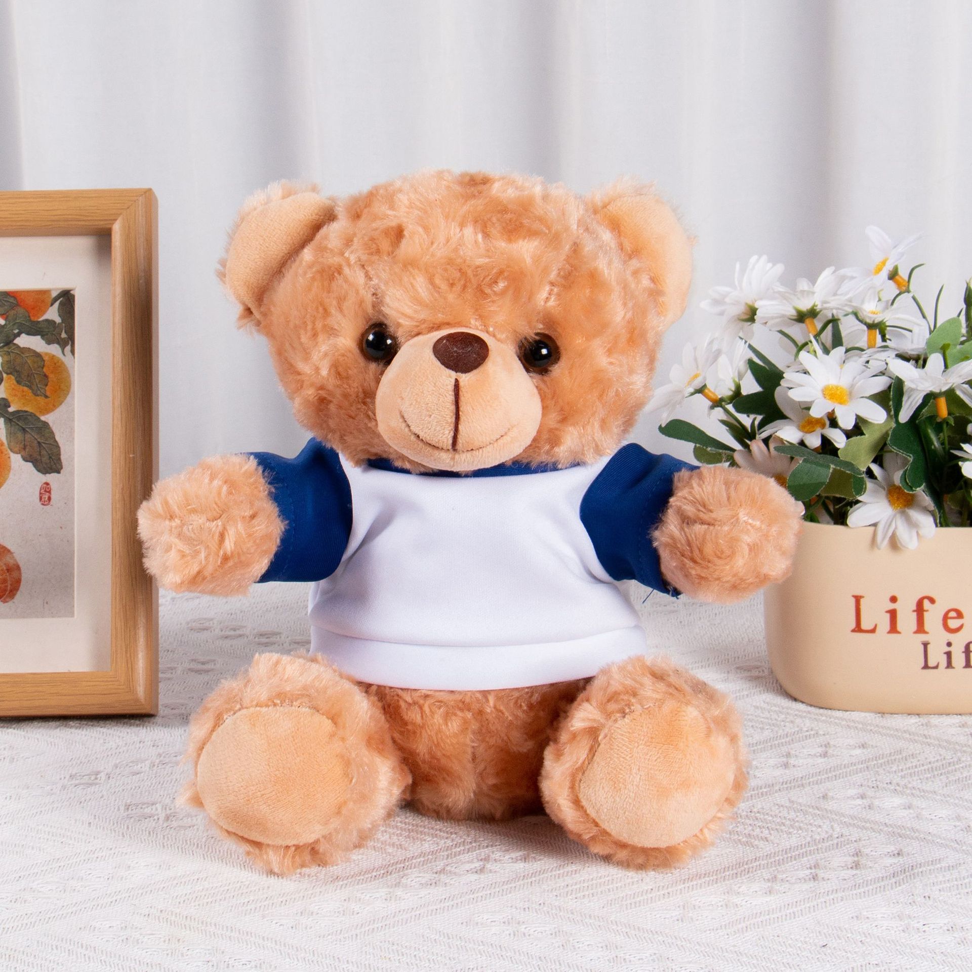 El oso marrón blanco azul