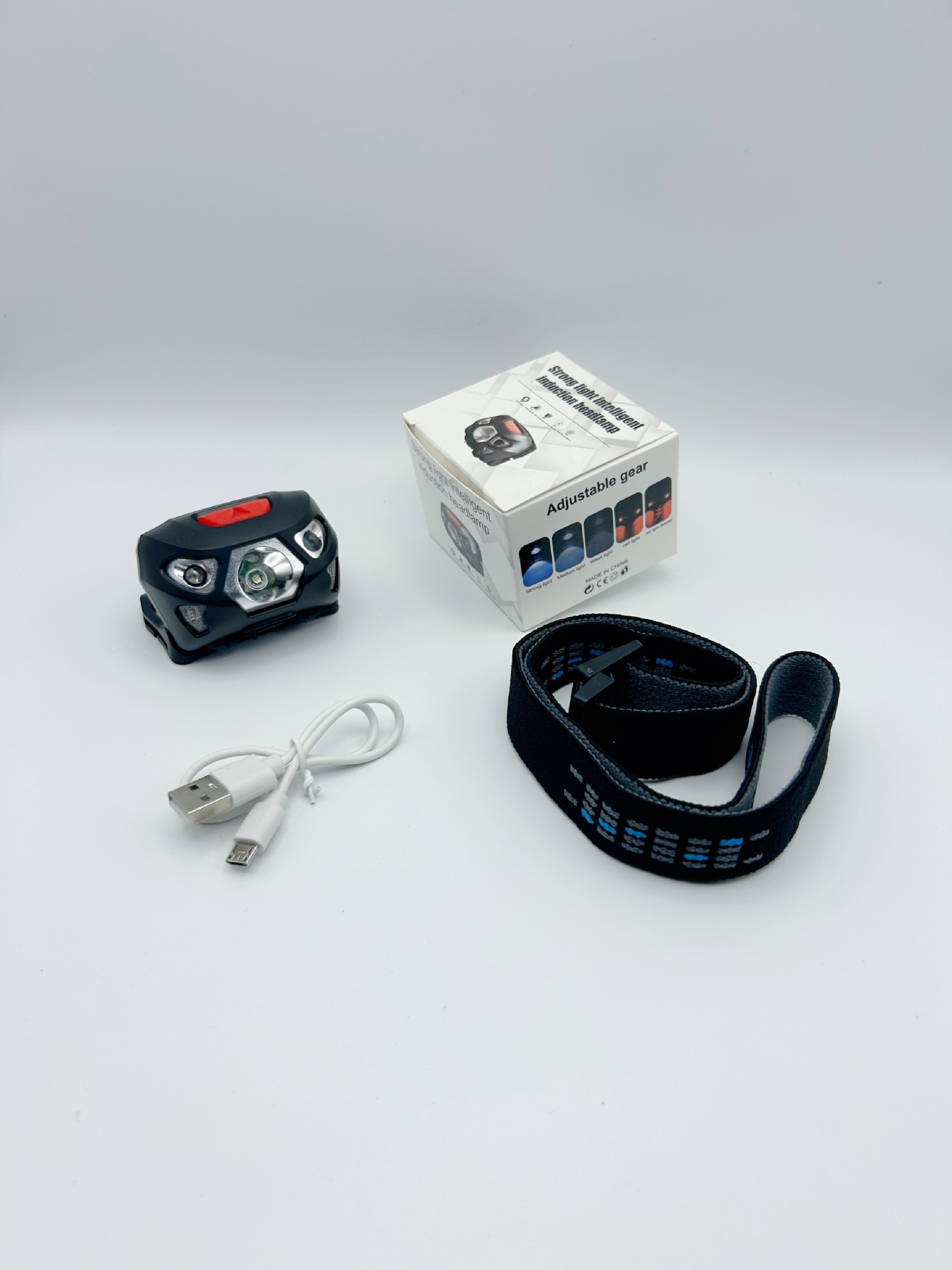 Nuevo faro de carga de luz brillante LED, pesca de inducción, batería de larga duración, pesca nocturna al aire libre, linterna montada en la cabeza