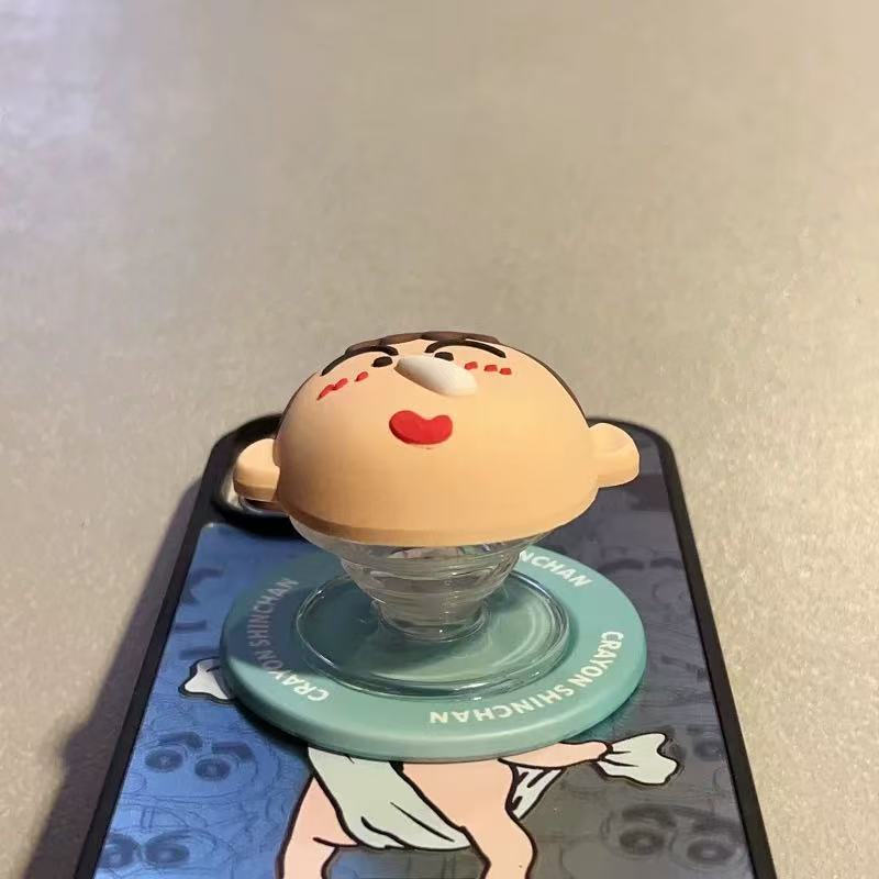 Caricatura de dibujos animados que fluye la nariz estúpida para el teléfono móvil MagSafe succión de soporte airbag anti-caída lindo estudiante retráctil