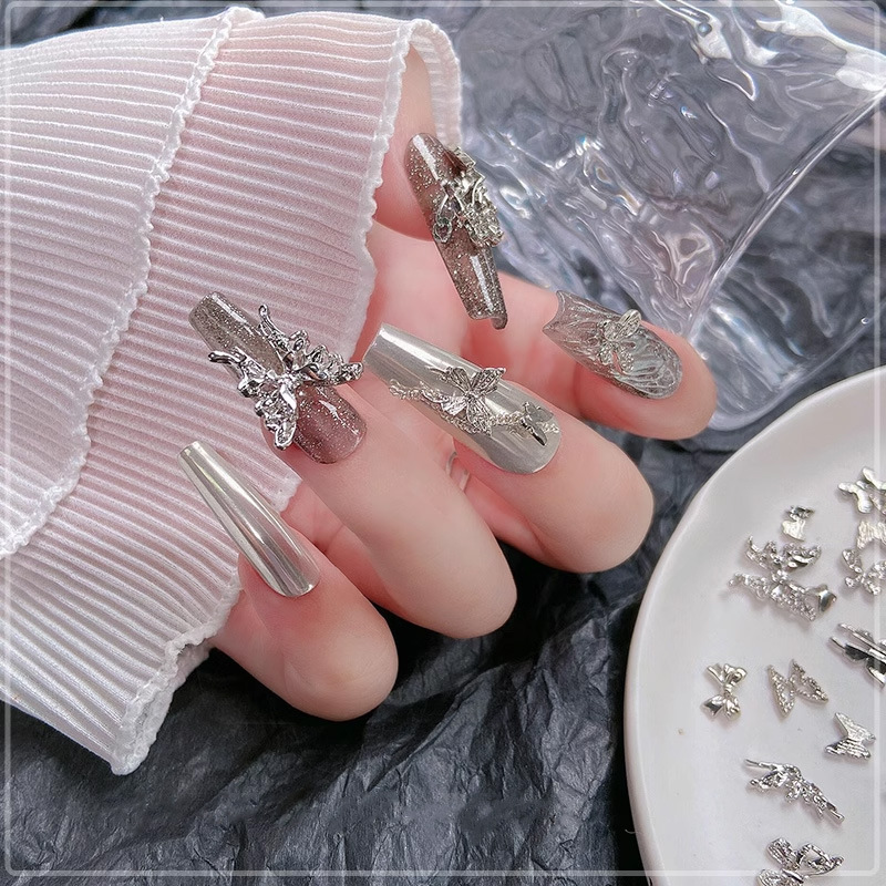 2023 Internet Celebrity nueva aleación de uñas joyería vintage blanco K serie aleación mariposa joyería accesorios de aleación