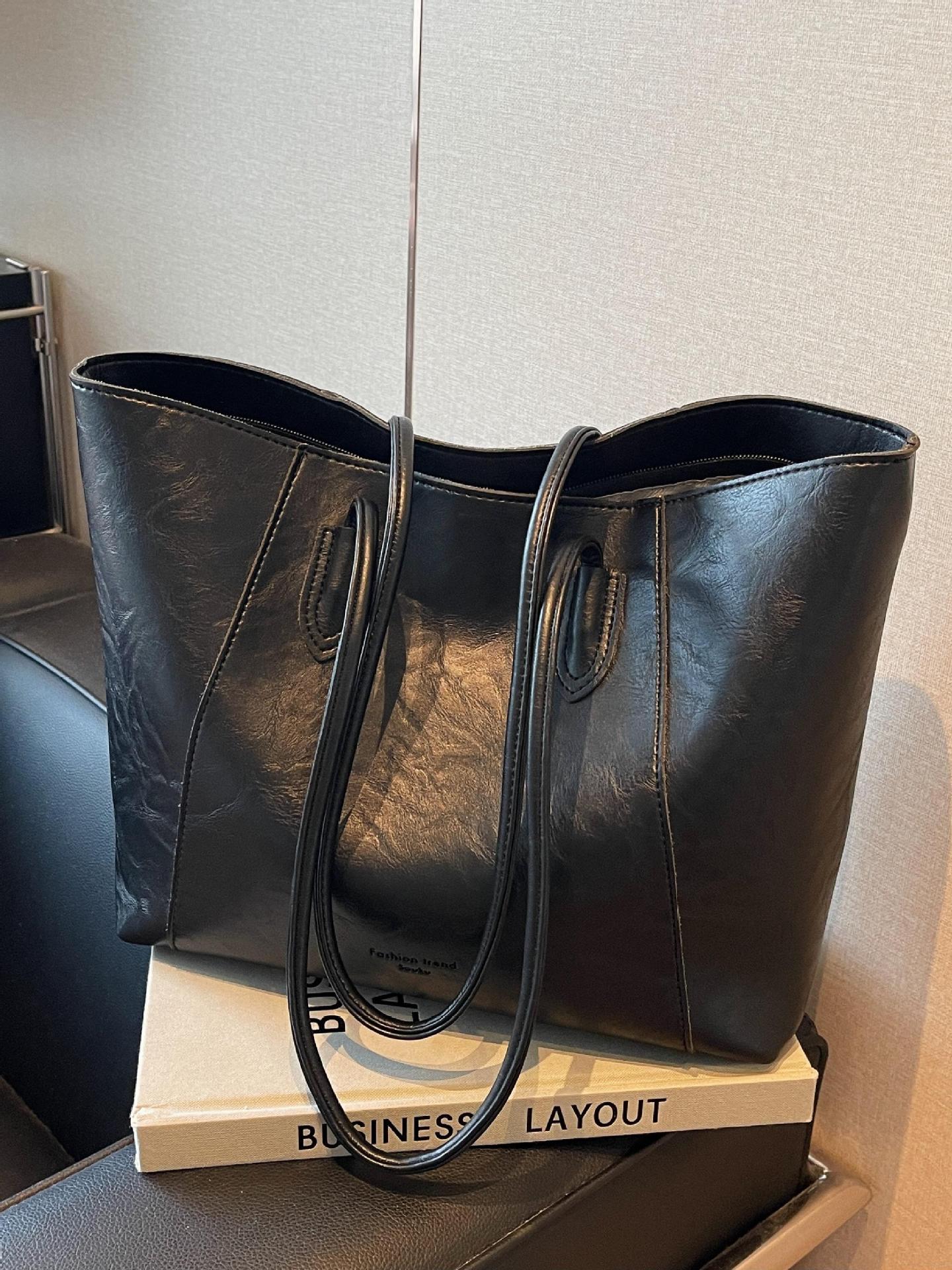 Bolsa de mano transfronteriza de gran capacidad para mujeres 2025 nueva bolsa de brazo portátil de viaje de alta calidad bolso de hombro casual