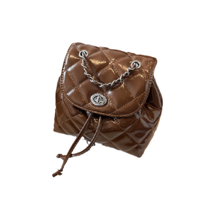 Mochila de cadena de diamantes de estilo occidental para mujer 2024 nueva mochila plateada de verano para estudiantes universitarios