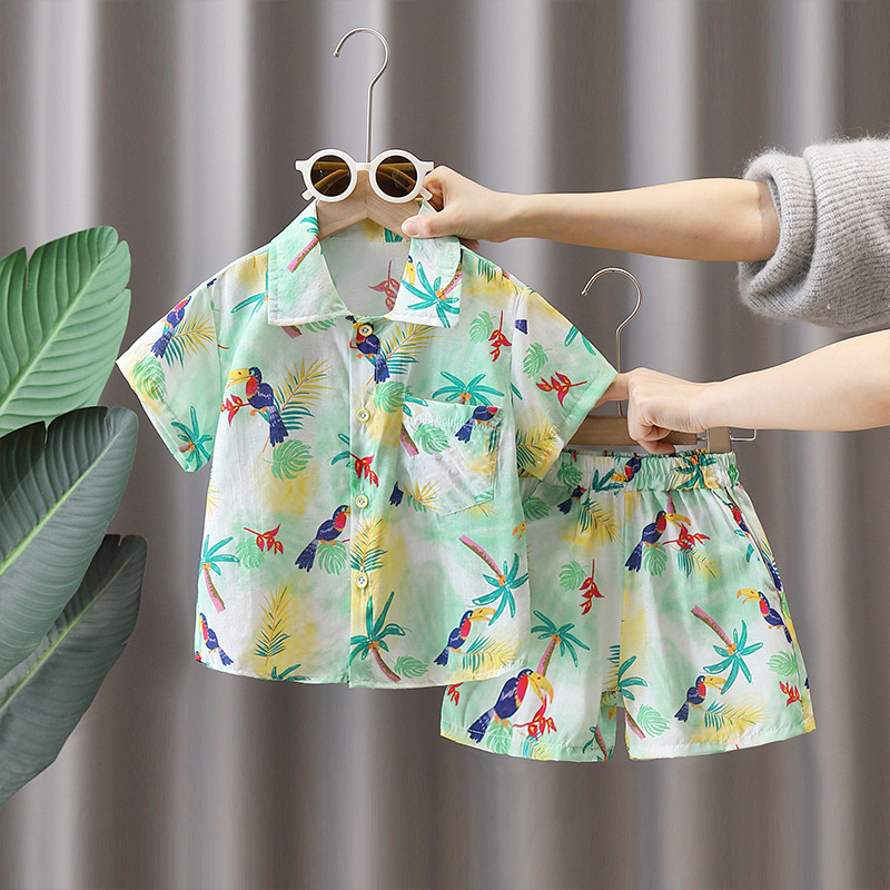 7115 Traje de verano para niños Camisa de estilo de playa de manga corta para niños 2025 Nuevo traje de dos piezas de viaje de verano para niños