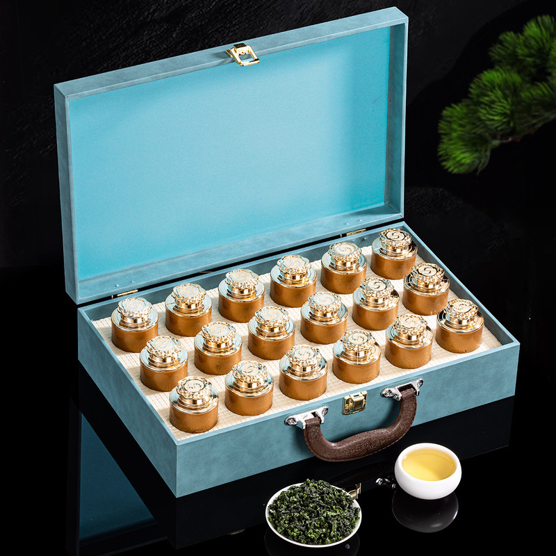 正月祭りに鉄観音茶葉の濃い香りのウーロン茶新茶の高級な小さい缶のお茶のギフトボックスをプレゼントします。|undefined