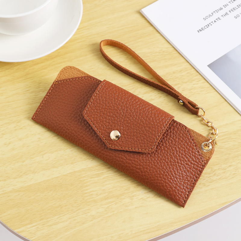 Caja de gafas de cuero de PVC al por mayor, botón de torsión suave pu, gafas de miopía, bolsa de gafas de sol, venta directa de fábrica