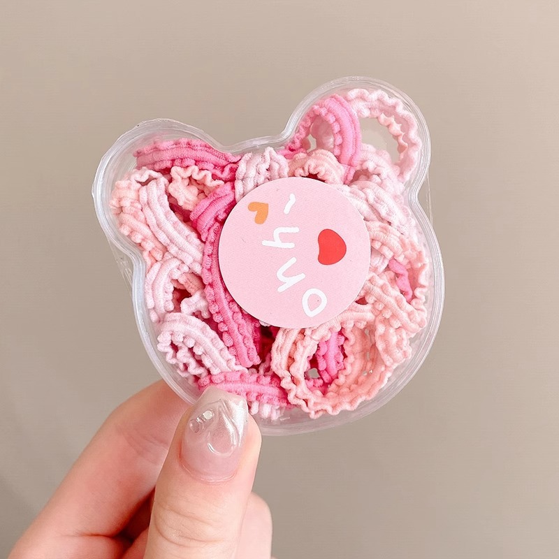 Las muchachas de la cuerda del pelo del color del caramelo no hacen daño al pelo pequeña tira de goma Lazo de la cuerda del pelo tocado niños lindos cubierta de cuero de la banda del pelo del bebé