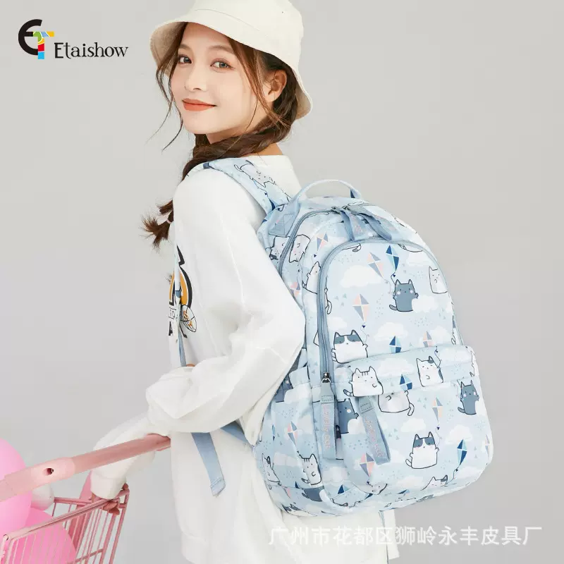 2024新款卡通猫咪印花初中小学生书包女大容量学院风双肩背包代发