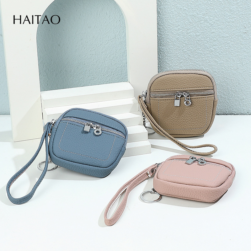 Nuevo lindo bolso de cambio de mano multifuncional simple sensación de alto nivel de doble cremallera lápiz labial bolso de tarjeta pequeña cartera