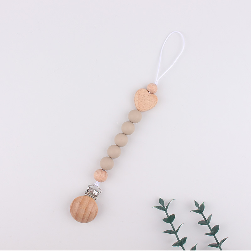 Clip de tetina de tres agujeros redondo de beech para calmar al bebé tetina de silicona de goma de diente anti-caída cadena