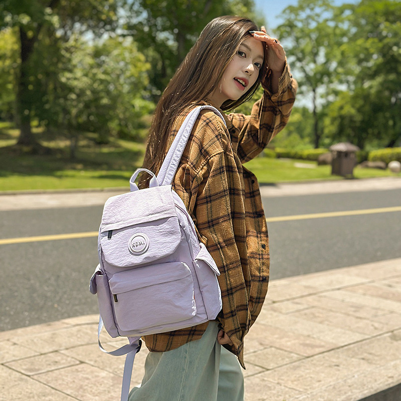 Casual, ligero y de gran capacidad, mochila para niños y niñas, mochila simple de color sólido para estudiantes de primaria, nueva mochila infantil transfronteriza