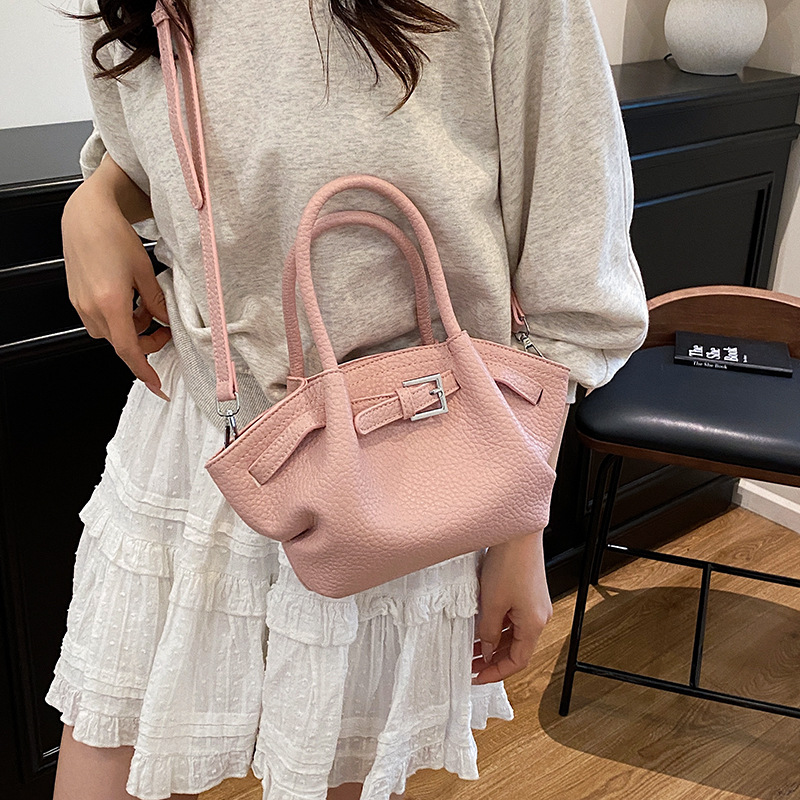 Bolso de textura transfronteriza 2025 verano nuevo estilo bolso de hombro con patrón de lichi bolso de mensajero casual de todo fósforo mujer