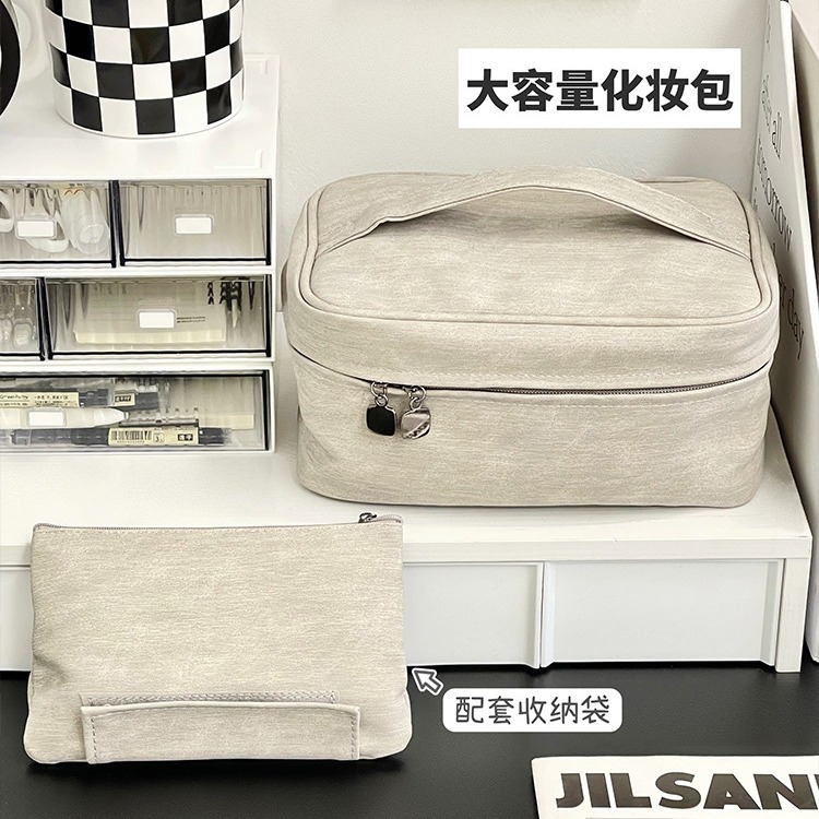 2023 nueva bolsa de cosméticos dos en uno bolsa de almacenamiento de alto aspecto bolsa de artículos de tocador de viaje simple de gran capacidad de estilo europeo