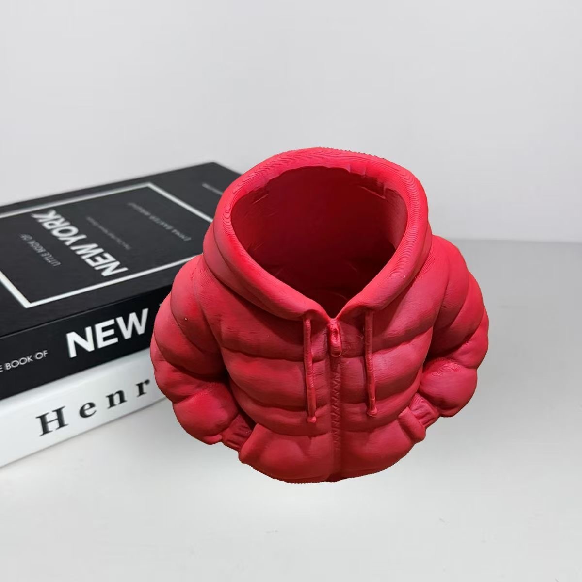 Red down jacket, pens holder
