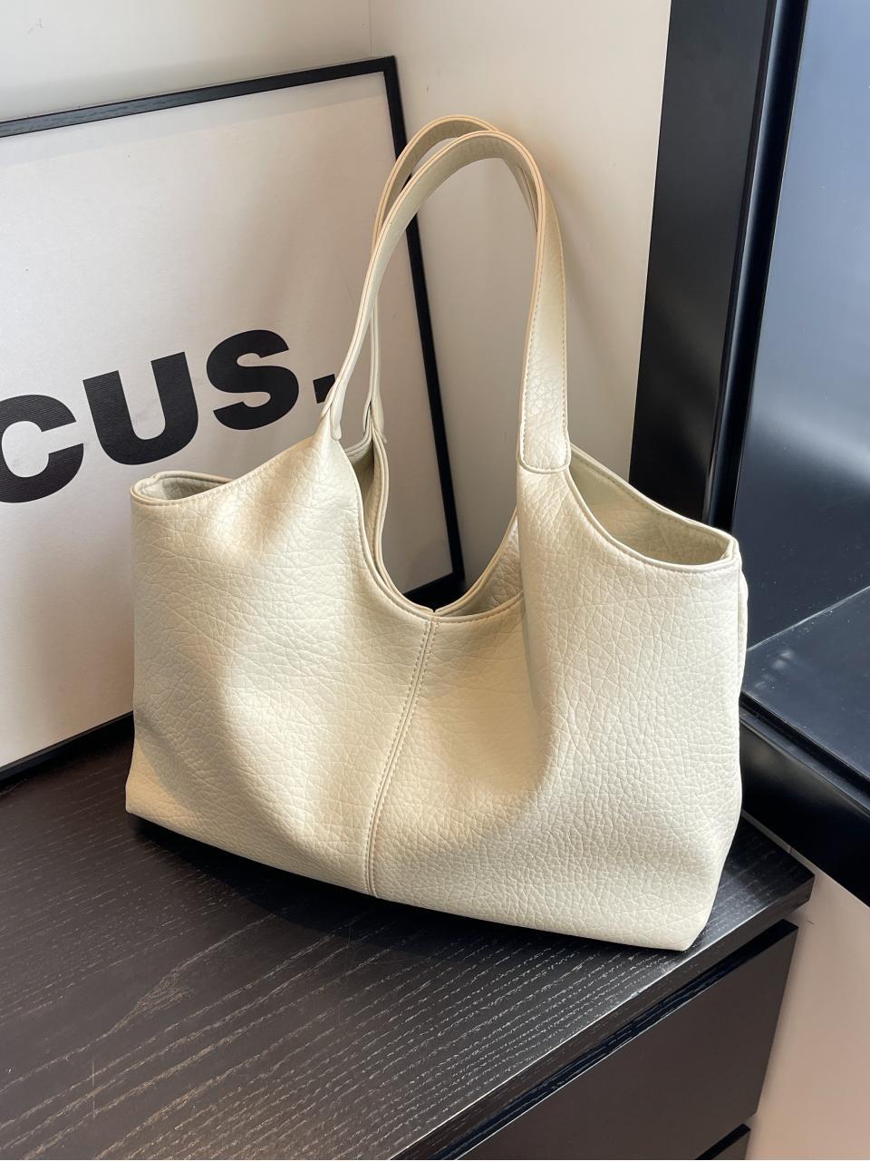 Bolsa de cuero suave transfronteriza para mujeres de gran capacidad 2025 nueva bolsa de hombro simple de textura casual