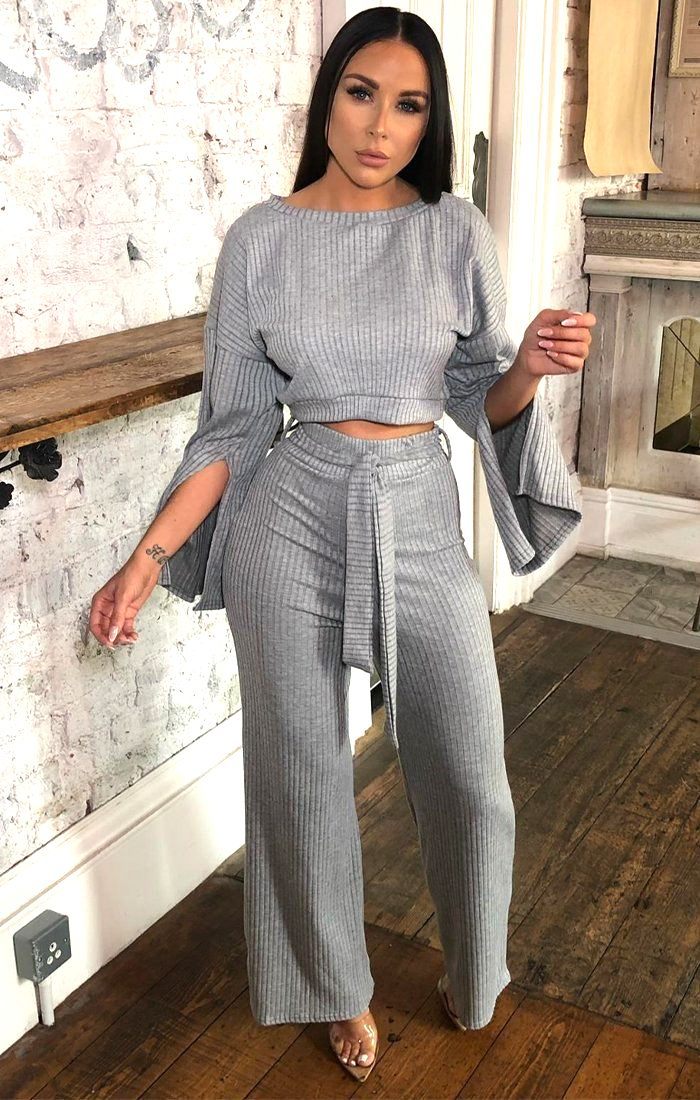 women s solid color slit cuff knit sweatshirt vertical wide leg pants two-piece suit nihaostyles clothing wholesale NSMFF79832