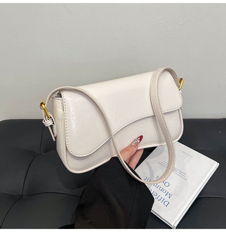 Bolso de hombro con hebilla magnética de nuevo estilo de alta calidad para viajar al trabajo, bolso de mujer simple de moda, bolso de axila, portátil diagonal