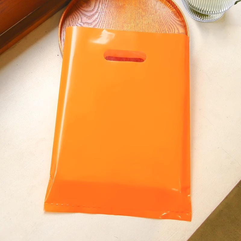 Bolsa de mano de tienda de ropa de grosor, bolsa de embalaje de ropa para niños y niñas, bolsa de almacenamiento de cosméticos, bolsa de regalo, bolsa de embalaje comercial