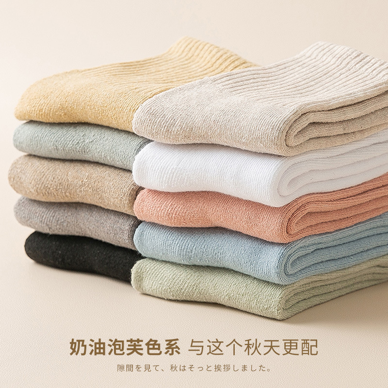 Calcetines de mujer de invierno forrado de lana gruesa caliente Terry Calcetines de piso de otoño e invierno de color sólido a media pantorrilla Zhuji calcetines al por mayor