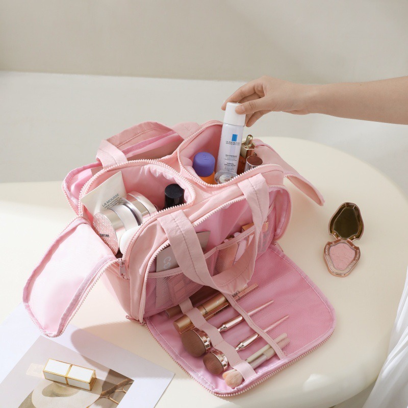 Almacenamiento de partición de bolsa de cosméticos de gran capacidad portátil pequeña y ligera mujer 2025 nueva bolsa de almacenamiento de viaje de alto valor