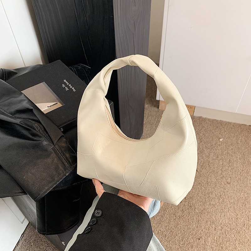 Bolsa de nube estilo minimal pliegue de la axila de la niña pliegue bolsa grande 2025 principios de primavera nuevo bolso de hombro mujer