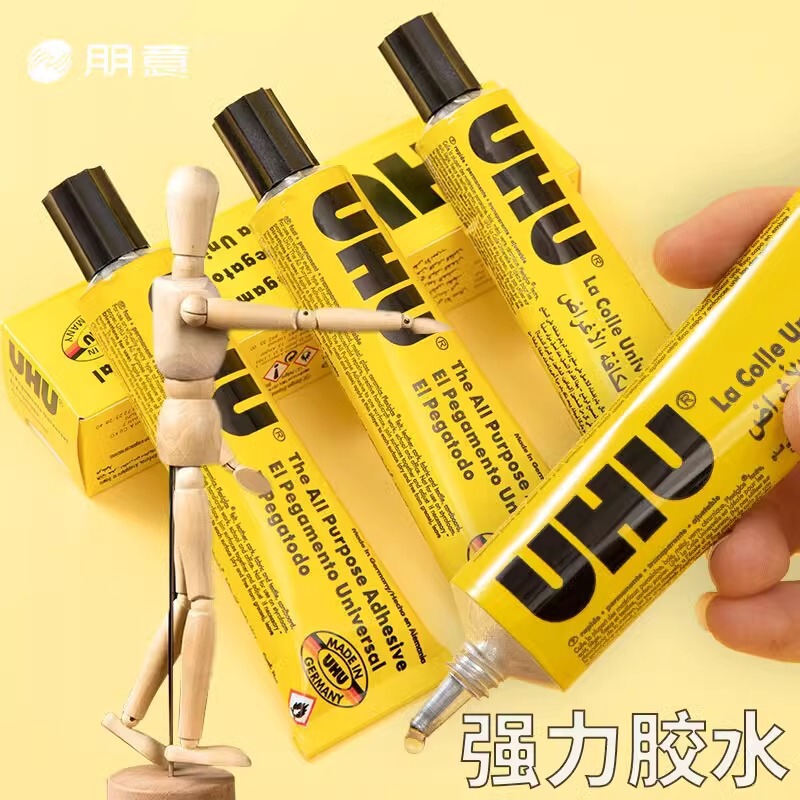 【新作】強化版UHU強力接着剤は手でしっかりと接着されています。|undefined