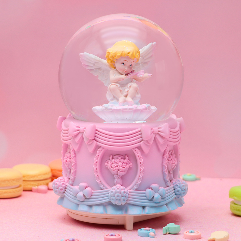 Dibujos animados creativo sueño mariposa bola de cristal caja de música nieve luminosa decoración de escritorio regalo de cumpleaños para niños al por mayor