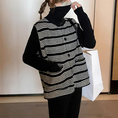 レトロな小衆の単列はストライプのメリヤスの女性の春の新型のゆったりしていて、やせているノースリーブのセーターのベストの上着を掛けます。