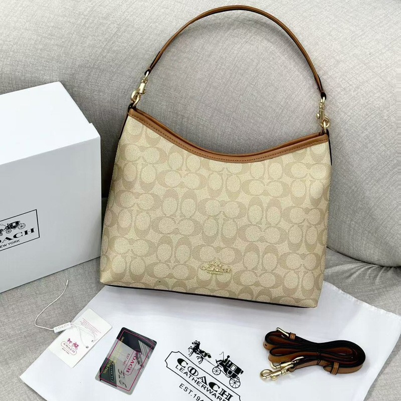Coach's New Laurela31 Hobo Bag, Versatile Large-Capacity Commuter Handbag, Underarm Bag, Single-Shoulder Crossbody Bag Coach's New Laurela31 Hobo Bag, Versatile Large-Capacity Commuter Handbag, Underarm Bag, Single-Shoulder Crossbody Bag