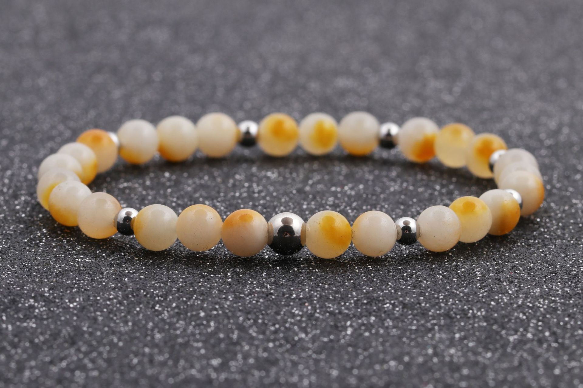 Europa y los Estados Unidos transfronterizos 6MM ojo de tigre ágata línea elástica cuentas pulseras pulseras granada brazalete de regalo para hombres y mujeres