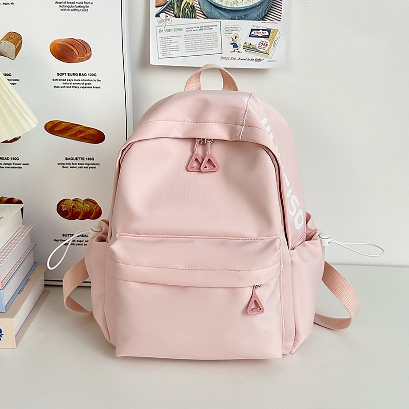 Mochila de gran capacidad para estudiantes de secundaria femenina simple y versátil para estudiantes de secundaria japonesa mochila de diseño