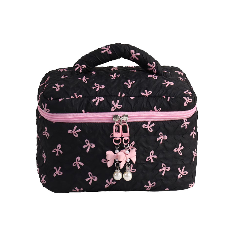 Nueva bolsa de almacenamiento de dormitorio de estudiantes de nicho de arco de maquillaje portátil de gran capacidad para salir a lavar