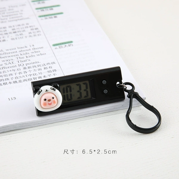 Black pocket watch, with little bears