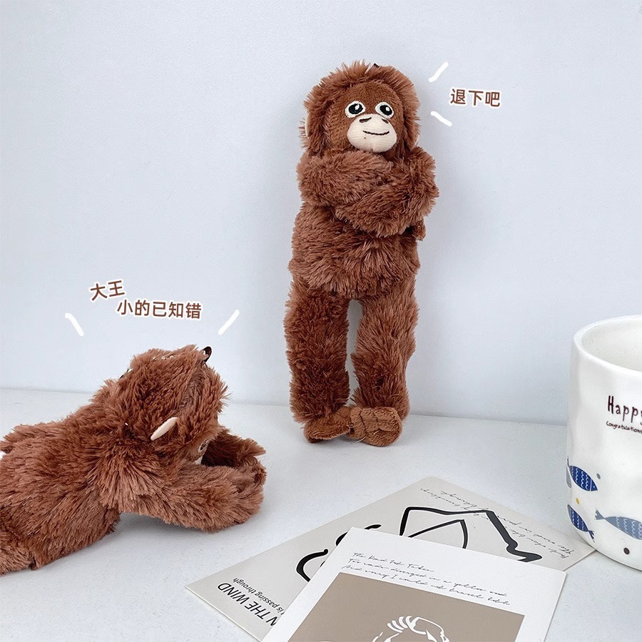 Red transfronteriza de celebridades lindo mono colgante juguete de peluche gorila de brazo largo muñeca bolso colgante llavero