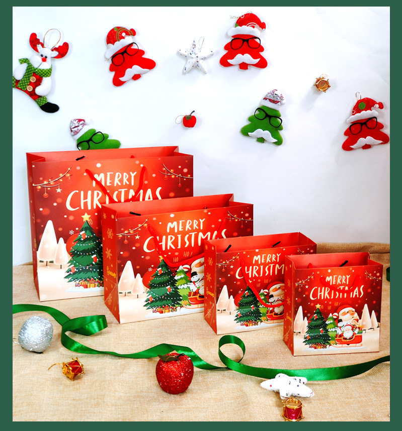 Nueva bolsa de regalo de Navidad bolso bolsa de papel al por mayor bolsa de regalo Portátil Bolsa de embalaje de dibujos animados