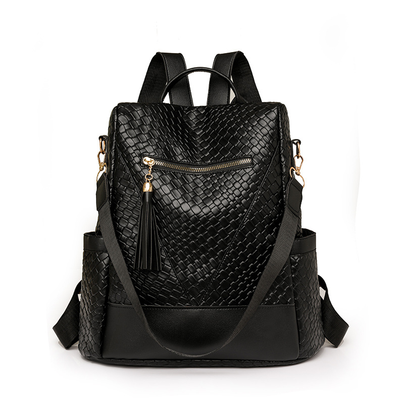 Comercio exterior al por mayor 2024 nuevas señoras casuales mochila antirrobo moda borla tejida mochila de viaje de doble uso marea