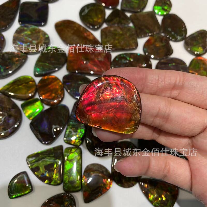 Natural spotted colored stone inlaid with bare spotted colored stone egg surface pendant Canadian spiral spotted colored beautiful factory wholesale