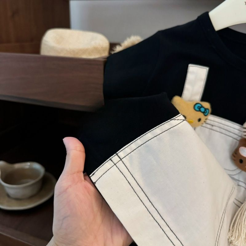 [Xianning Seven baby] 2025 verano niña falda de tirantes de dibujos animados falsa de dos piezas vestido de estilo occidental a juego falda linda