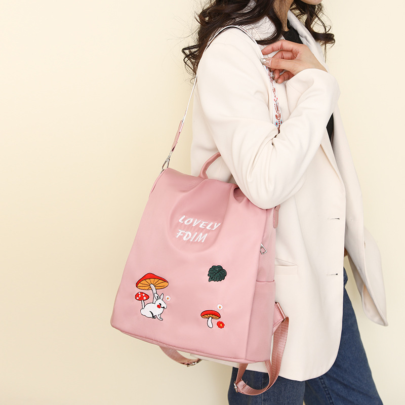 Comercio exterior al por mayor 2025 nueva mochila antirrobo para damas de alto valor moda bordado multifunción mochila de viaje marea