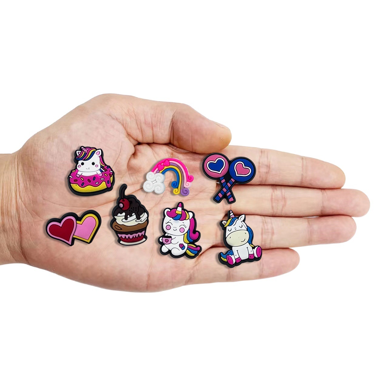 Invierno nuevo colorido unicornio serie agujero Zapatos flor Polaroid Arco Iris pony accesorios para niños transfronteriza en stock