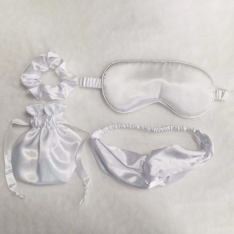 Máscara de ojo de seda artificial conjunto de cuatro piezas con regalo de mano Net Red intestino grueso banda de pelo bolsa de almacenamiento máscara de ojo de seda traje de dormir