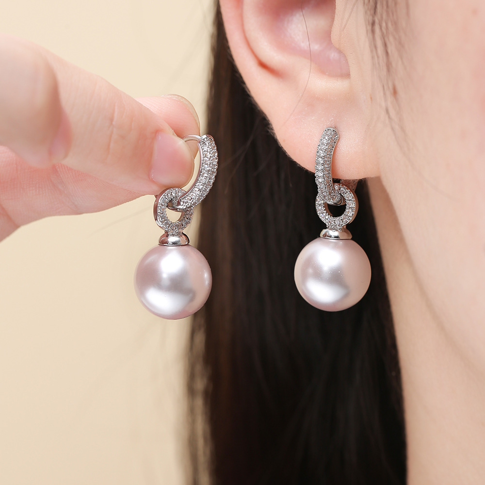 Elegant fashionable universal glass earrings from pearl with zircon