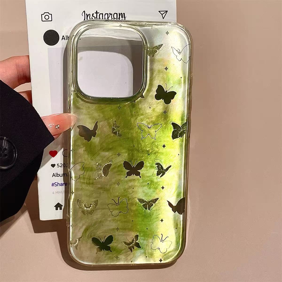 Mariposa Halo de fondo verde de una sola cáscara ej